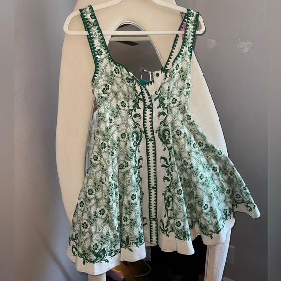 ALÉMAIS
Olive printed linen and cotton minidress
size small - Picture 3 of 3